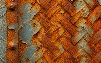 Where rust weaves, observe industrial corrosion